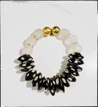 Load image into Gallery viewer, Recycled Glass &amp; Black Polka Dot Bone Bead Stretch Bracelet: 7”
